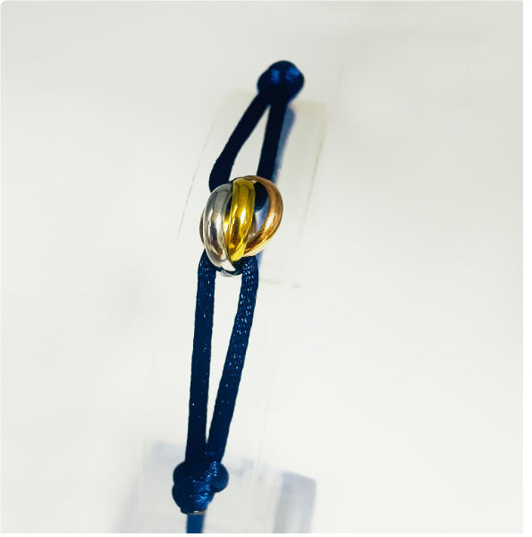 Pulsera ajustable azul claro con anillos entrelazados de acero inoxidable – Unisex y minimalista