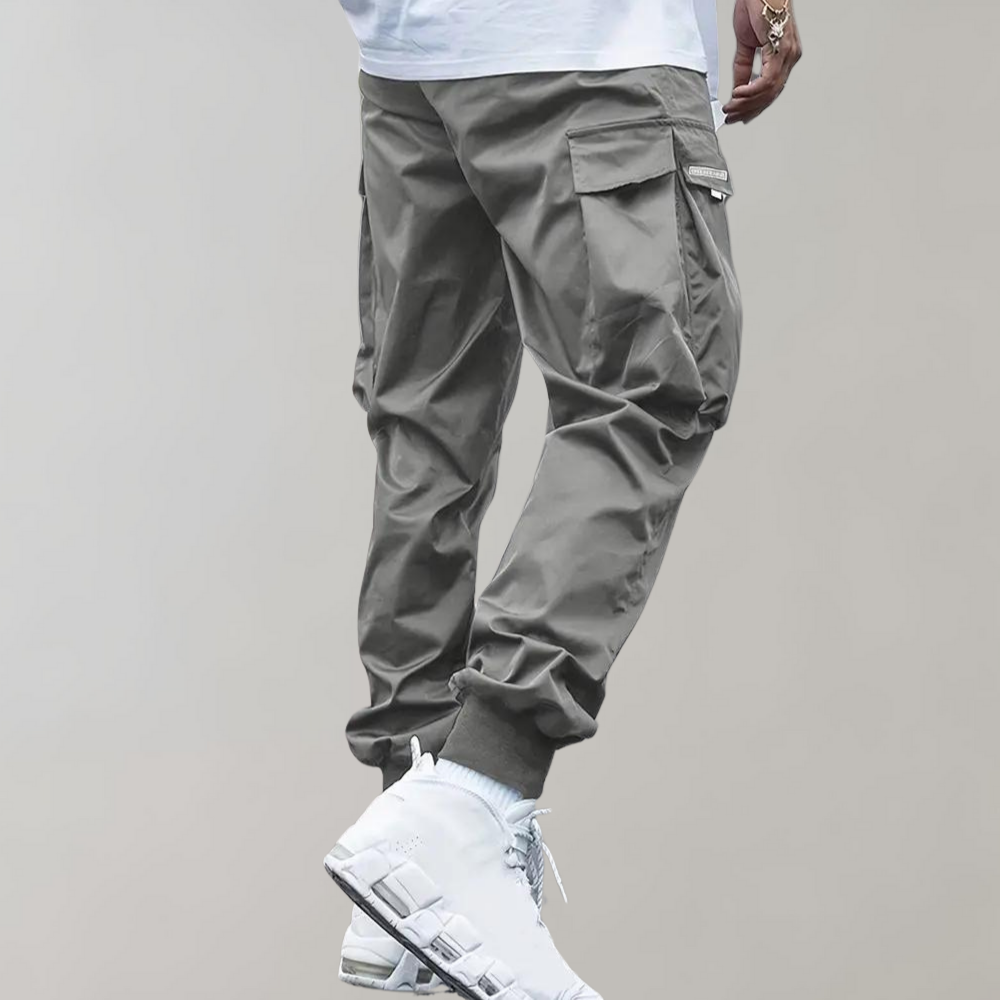 Pantaloni cargo da jogging da uomo – Pantaloni streetwear viola con tasche con cerniera e polsini